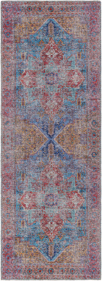 Close-up of the Otaki Washable Area Rug in dark gray, dark purple, multi brown, and natural gray with a traditional pattern. Design-Runner-2773