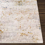 Close up of Palhi Area Carpet showing cream, gray, mustard, and blue abstract pattern on a dark wood floor. Front