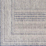 Close-up of the Panaytayon Area Rug showing its woven texture and geometric pattern in cream, natural gray, and navy. Swatch