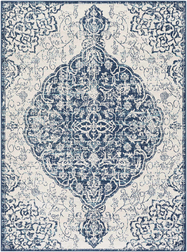 Close-up of the Pannal Area Rug. Light beige rug with navy and light blue oriental-inspired floral medallion pattern. Design-Rectangle-537
