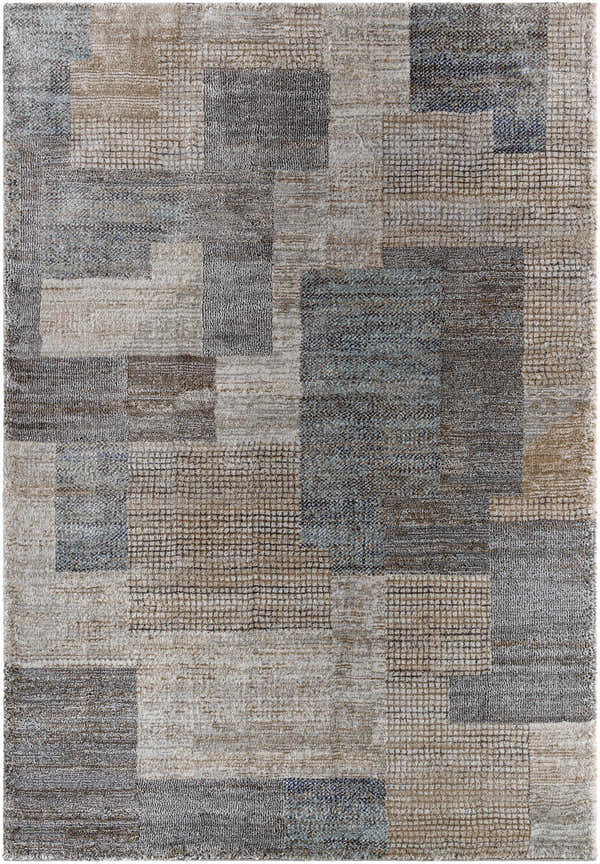 Close-up of the Paulo Area Rug, featuring a geometric Southwestern design in gray, smoke, and neutral tones. Design-Rectangle-537