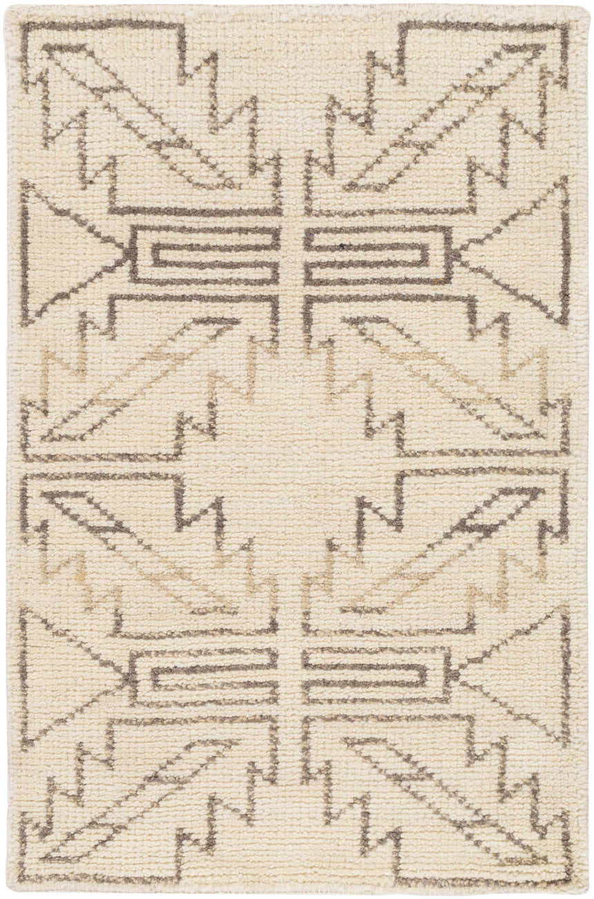 Close-up of the Pawhuska Area Rug. Hand-knotted wool rug in charcoal and peach with a geometric, farmhouse-style pattern. Design-Rectangle-23