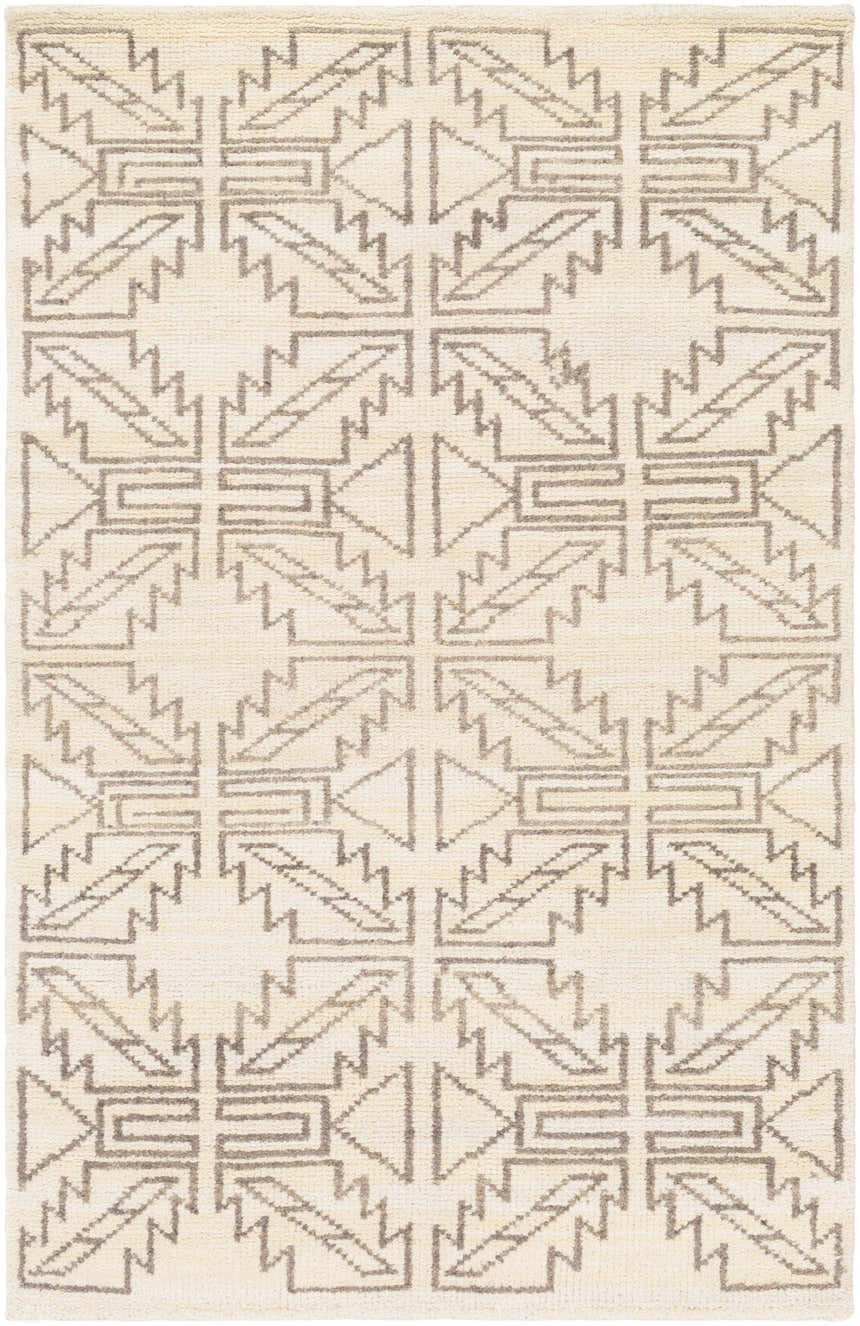 Close-up of the hand-knotted Pawhuska Area Rug. Charcoal and peach farmhouse design on 100% wool. Traditional rectangle rug. Design-Rectangle
