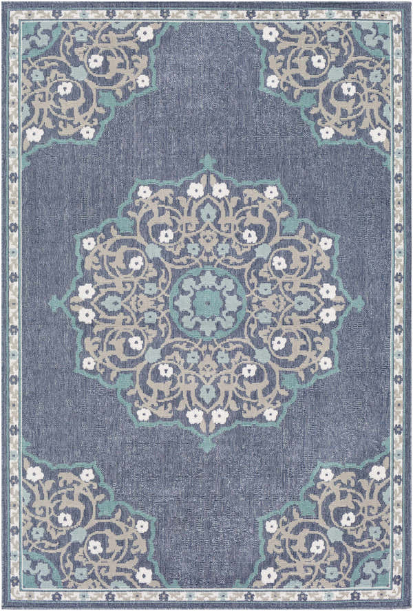 Detailed view of the Penland Area Rug showcasing its navy, teal, and taupe floral medallion design. Design-Rectangle-5376