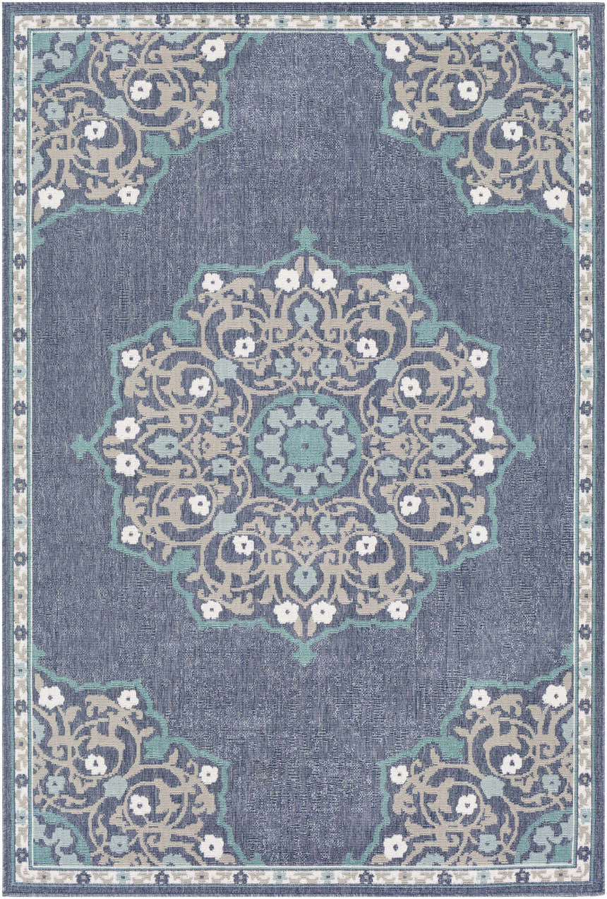Detailed view of the Penland Area Rug showcasing its navy, teal, and taupe floral medallion design. Design-Rectangle-5376