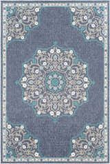 Close-up of the Penland Area Rug. Navy olefin rug with a traditional floral medallion pattern in teal, taupe, and white. Design-Rectangle-76109