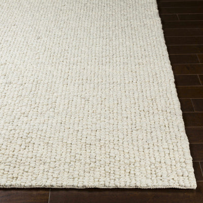 Penmaenmawr Solid Cream Premium Woven Wool Area Rug