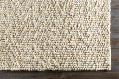 Penmaenmawr Solid Cream Premium Woven Wool Area Rug