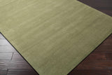 Brockton Solid Green Hand Loomed Wool Area Rug
