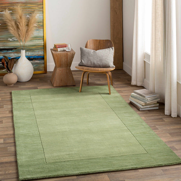 Bordered Solid Green Wool Rug