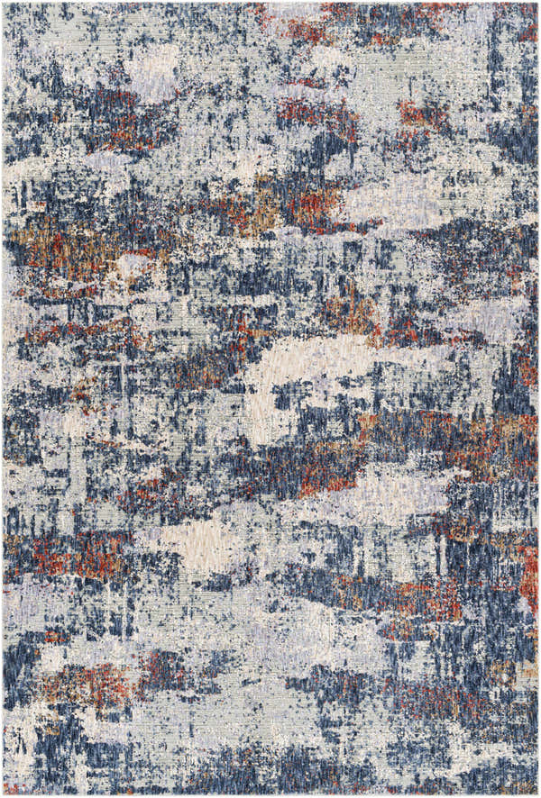 Close-up of the Pictou Area Carpet, featuring a contemporary abstract design in brick red, brown, denim blue, and light gray. Design-Rectangle-5373
