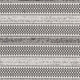 Close-up of Planada Washable Area Rug, black and cream cotton with a bohemian-inspired geometric pattern. Swatch