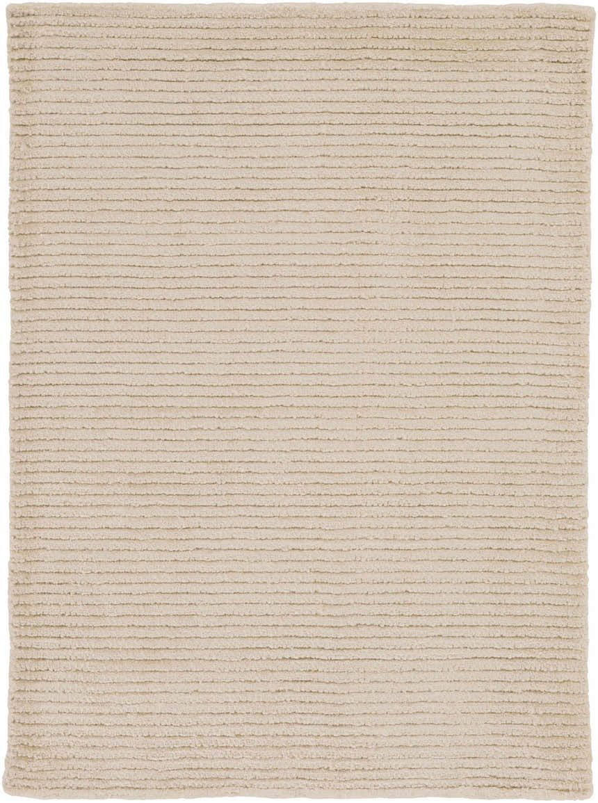Close-up of the Plummer Area Carpet. Hand-woven, beige rug with a subtle striped texture. Farmhouse style. Design-Rectangle-23