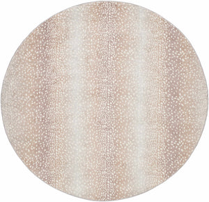 Close-up of a round Pointblank Tan Leopard Print Rug. Features a tan and ivory animal print pattern. Design-Round-710