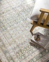 Close-up of the PNW Home Rainier Damask Green Washable Rug with a traditional floral pattern and a soft, inviting texture. Styleshot