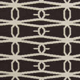 Close-up of the Potsdam Area Rug showing its dark brown and peach geometric, hand woven wool design. Swatch