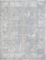 Close-up of the Pryce Blue Gray Thick Luxe Boutique Rug, showing its traditional pattern, charcoal, cream, and gray colors. Design-Rectangle-710103