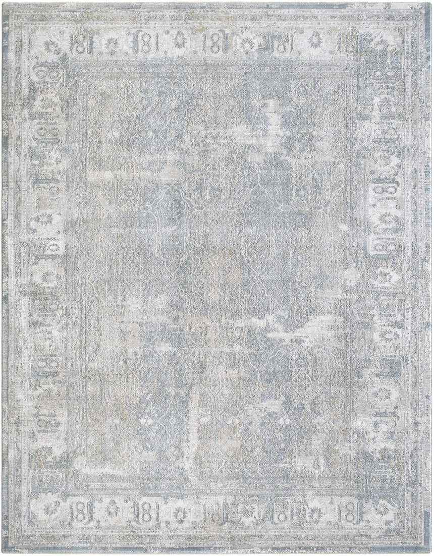 Close-up of the Pryce Blue Gray Thick Luxe Boutique Rug, showing its traditional pattern, charcoal, cream, and gray colors. Design-Rectangle-710103