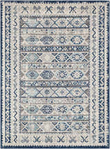 Close-up of the Purdys Area Rug. Bohemian style rug with aqua, charcoal, cream, and blue geometric patterns. Design-Rectangle-5373