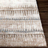 Close-up of the Prees Area Rug showing its contemporary design, cloud gray, cream, and brown tones, and machine-woven texture. Front