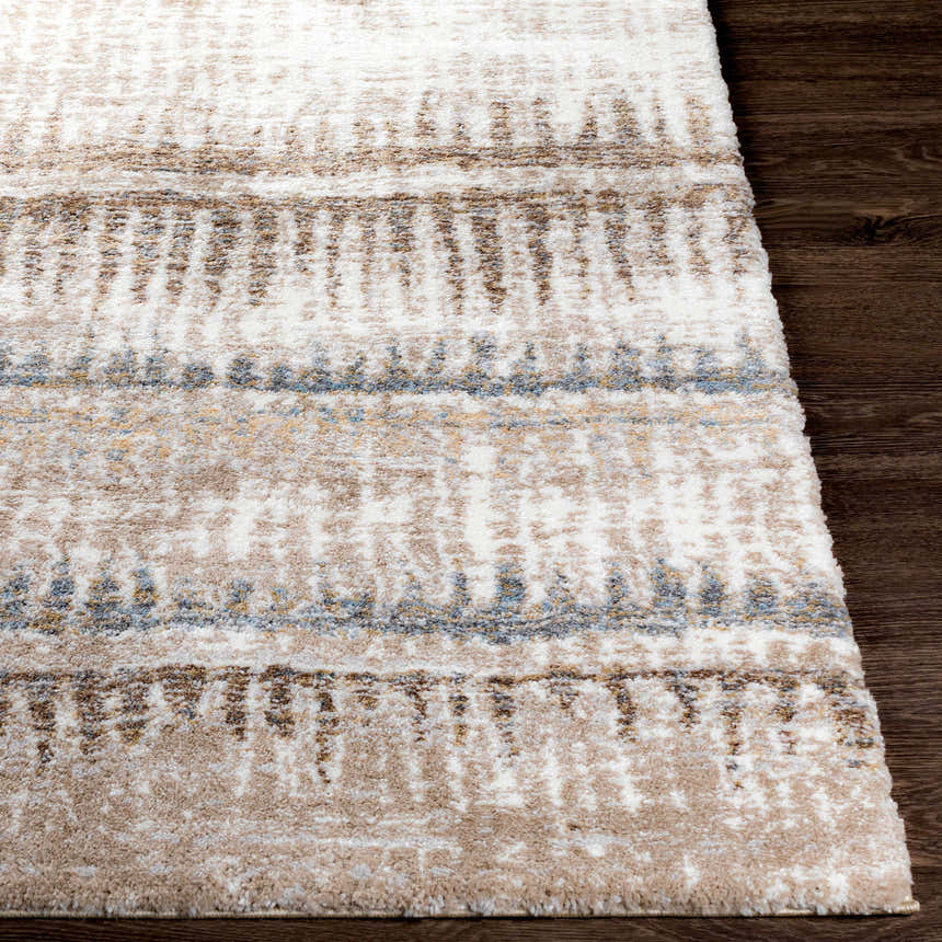 Close-up of the Prees Area Rug showing its contemporary design, cloud gray, cream, and brown tones, and machine-woven texture. Front