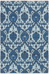 Close-up of the Premier Area Rug Clearance, a hand-woven cotton rug with a blue floral and tulip pattern. Design-Rectangle-576