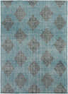 Close-up of the Presidio Area Carpet. Black floral medallions on an emerald, hand-knotted wool rug. Design-Rectangle