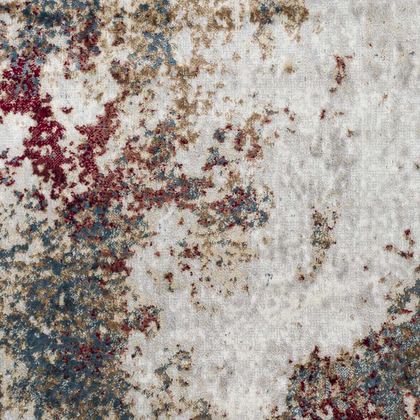 Close-up of the Prinza Area Carpet showcasing its abstract design in dark gray, nutmeg, and taupe. Swatch