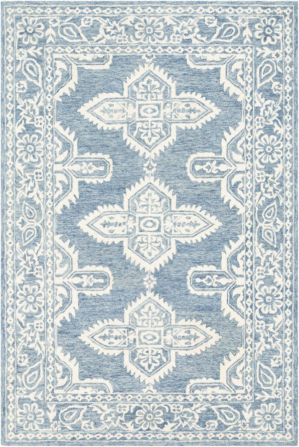 Close-up of the Passaic Hand Tufted Wool Rug. Features a blue and light beige oriental design with a traditional floral border. Design-Rectangle-576