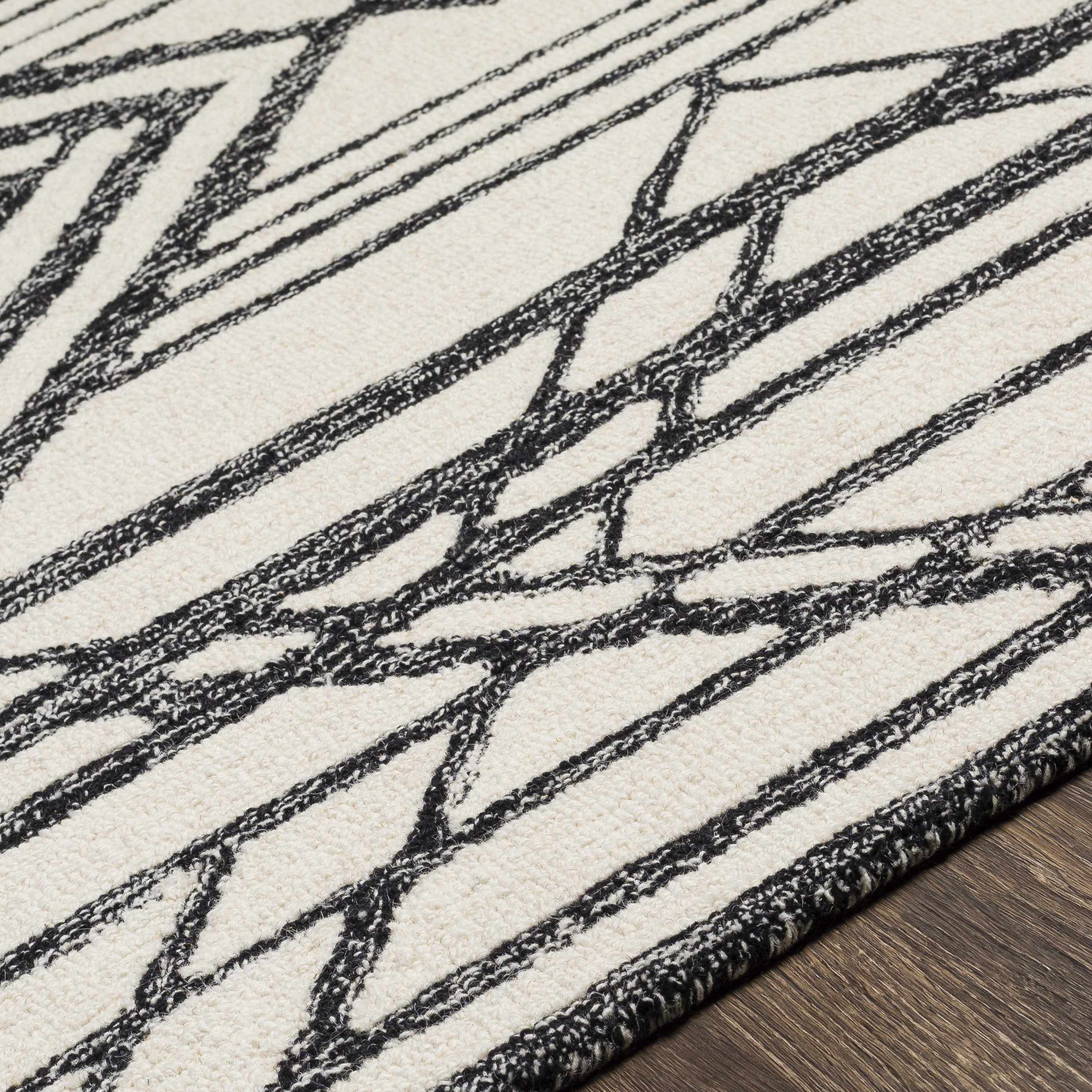 Close-up of the texture on Pottsgrove Area Rug - Clearance, showing fabric weave and feel. Contemporary Area Rug Backing Canvas 