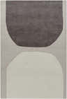Close-up of the Adhara Area Rug. Hand-tufted wool rug in dark purple, medium gray, and sterling gray with a contemporary design. Design-Rectangle-576