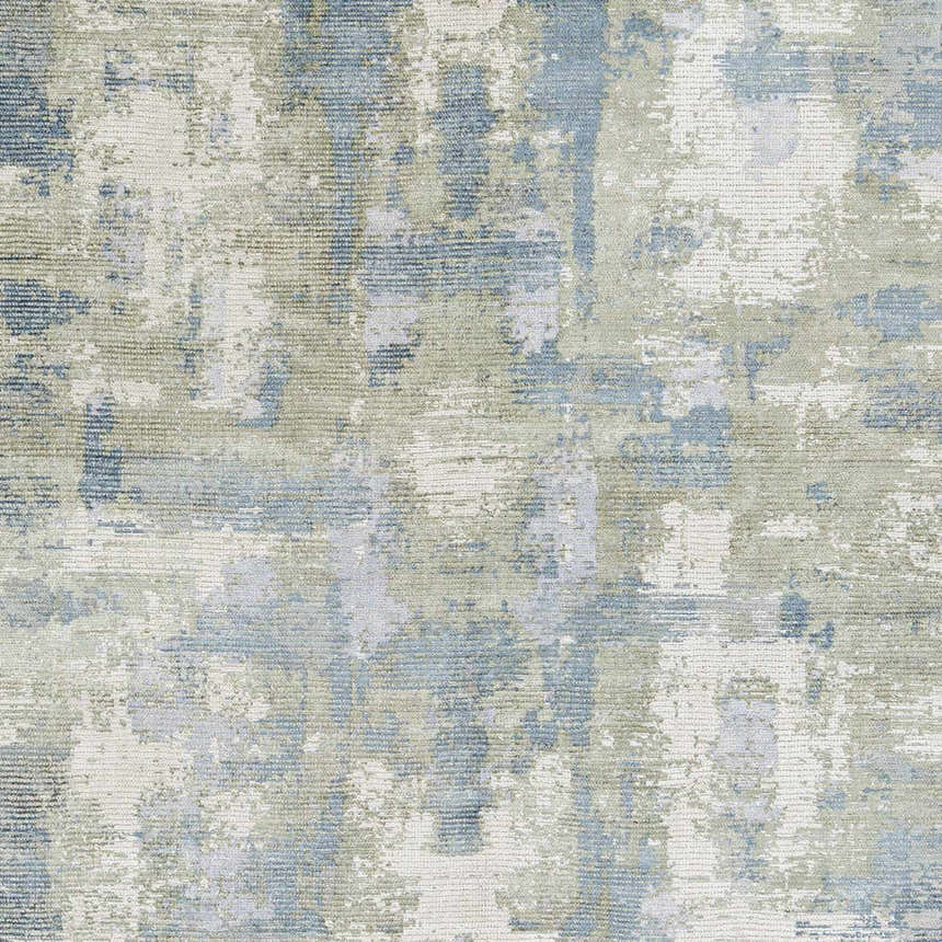 Close-up of the Pyle Area Rug, a contemporary design in beige, blue, sage, and light beige. Hand-knotted wool and viscose texture. Swatch