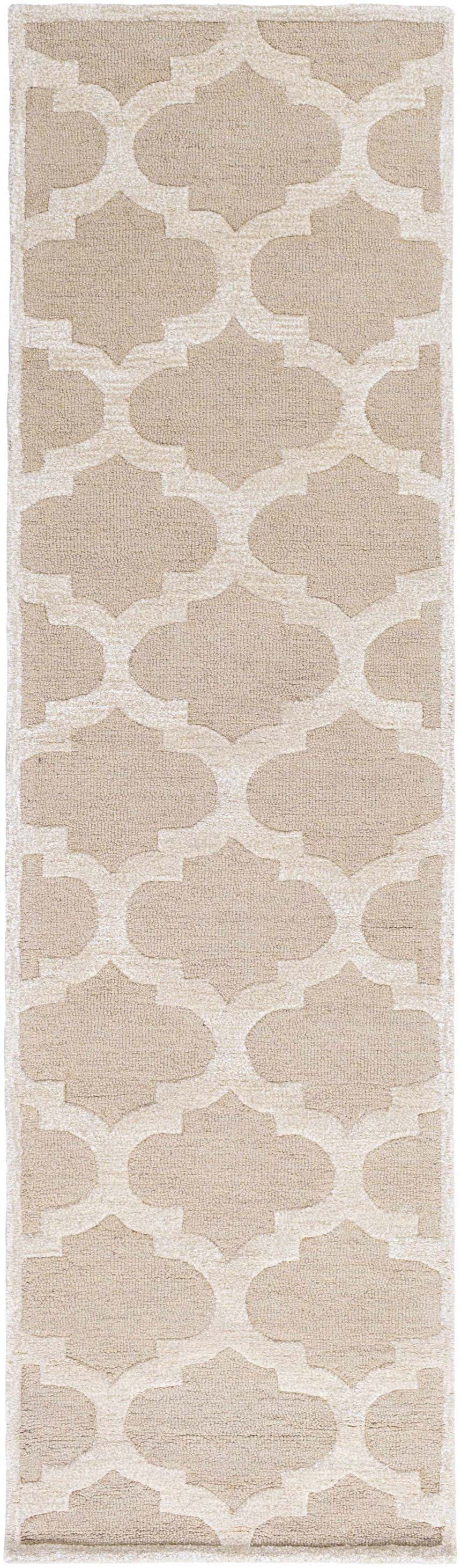 Close-up of the Quicksand Area Rug runner. Hand-tufted wool rug with a neutral beige and ivory quatrefoil pattern. Design-Runner-38