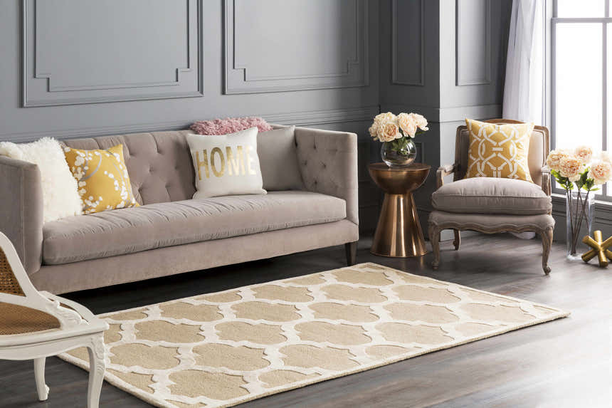 Living room with a beige Quicksand Area Rug, neutral sofa, and gray walls. Roomscene-Rectangle