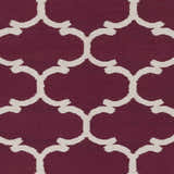 Close-up of Racine Area Carpet. Dark purple rug with an ivory quatrefoil pattern. Hand woven cotton rug texture. Swatch