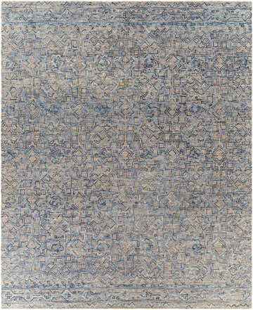 Close-up of the hand-tufted Radisson Area Rug. Farmhouse style wool rug in blue, navy, and taupe with geometric patterns. Design-Rectangle-810