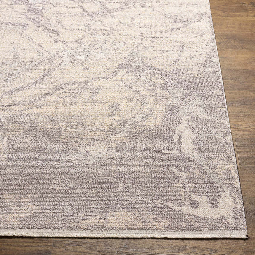 Close up of the Rahm Ivory Marble Area Rug showing the ivory, light gray, and charcoal marble pattern. Front