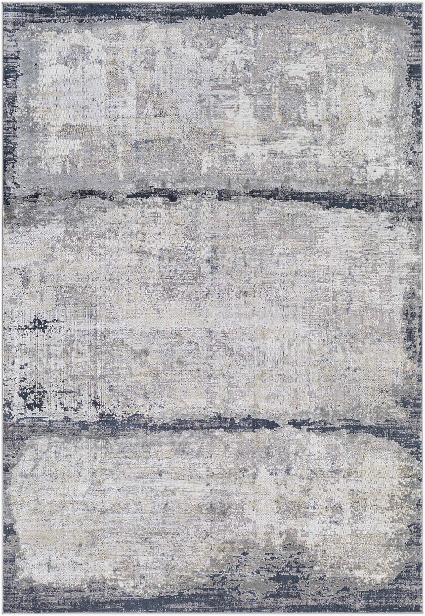 Close-up of the Rainworth Modern Slate Luxe Rug. Charcoal, dark blue, beige, and gray abstract design with a distressed texture. Design-Rectangle-573