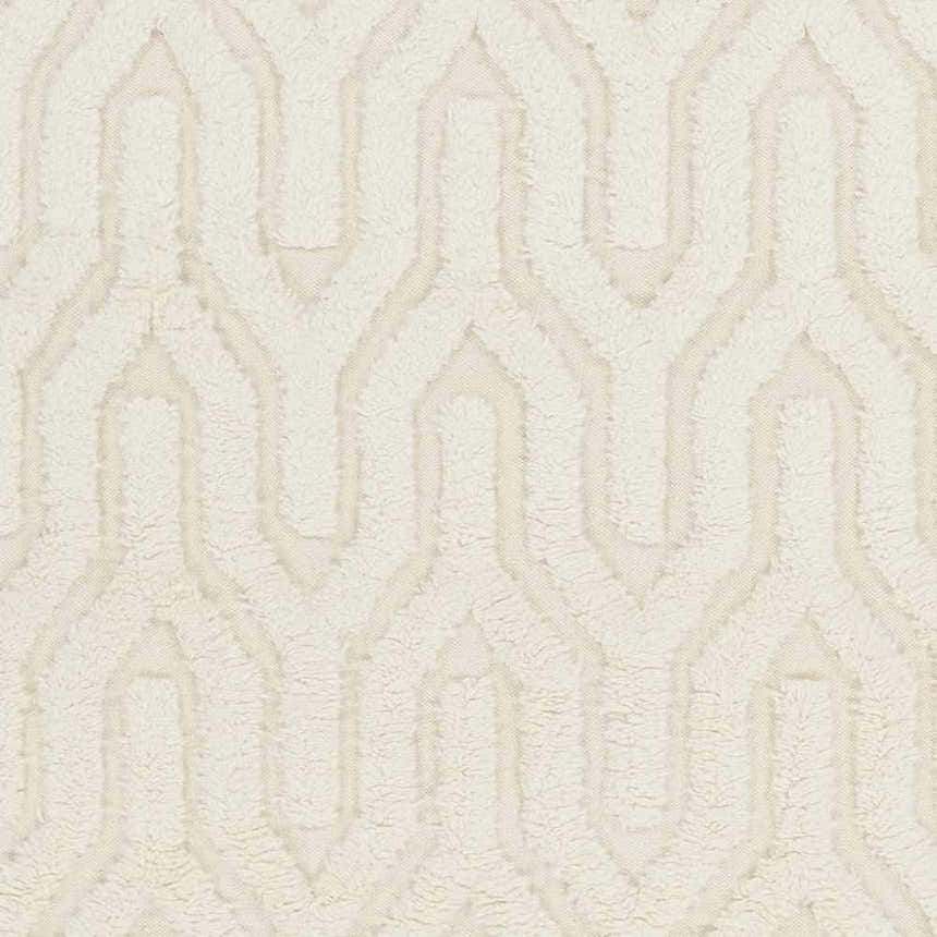 Close-up of the cream Ransom Area Rug. Hand woven wool shag rug with a geometric pattern. Contemporary style. Swatch