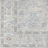 Close-up of Rochedale Area Rug showing traditional pattern in cream, lavender, olive, pale blue, and sage. Machine woven texture. Swatch