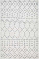 Close-up of the Rick Area Rug. Hand-woven rug with an arctic stone base and dark gray geometric diamond pattern. Design-Rectangle-576