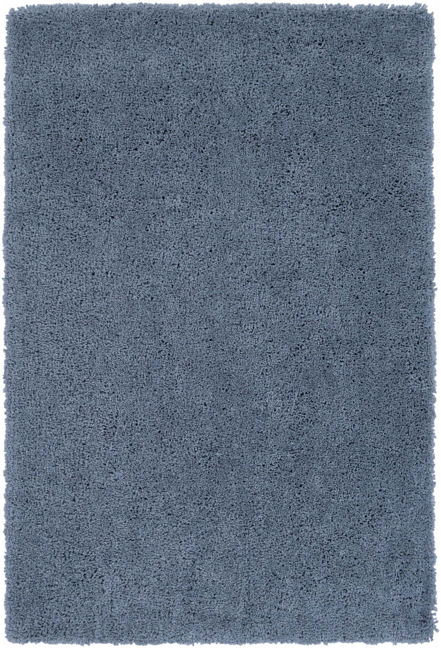 Close-up of the teal Rocklake Clearance Rug, a hand-woven shag rug with a soft, textured pile. Design-Rectangle-576