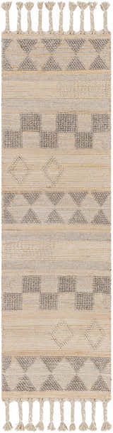 Close-up of the Ardee Totem rug. Tan jute and gray wool blend with geometric patterns and braided fringe detail. Design-Runner-268