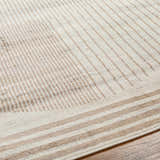 Close up of Zeke Geometric Nutmeg Rug showing its linear pattern and soft nutmeg and lambswool colors. Texture