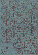 Close-up of the Redvale Area Rug. Teal background with a detailed burgundy, hand-knotted, floral pattern. Design-Rectangle-811