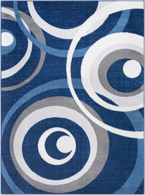 Close-up of the Renmark Performance Rug - Clearance, featuring a blue base with cream, gray, and light blue circle pattern. Design-Rectangle-537