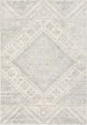 Close-up of the Renton Area Rug, a machine-woven rug in gray, ivory, and silver gray with a Bohemian-inspired geometric pattern. Design-Rectangle-5373