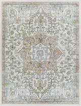 Close-up of the Reubens Area Rug: a machine-woven, rectangular rug with a traditional floral pattern in pale blue, peach, and yellow. Design-Rectangle-710103