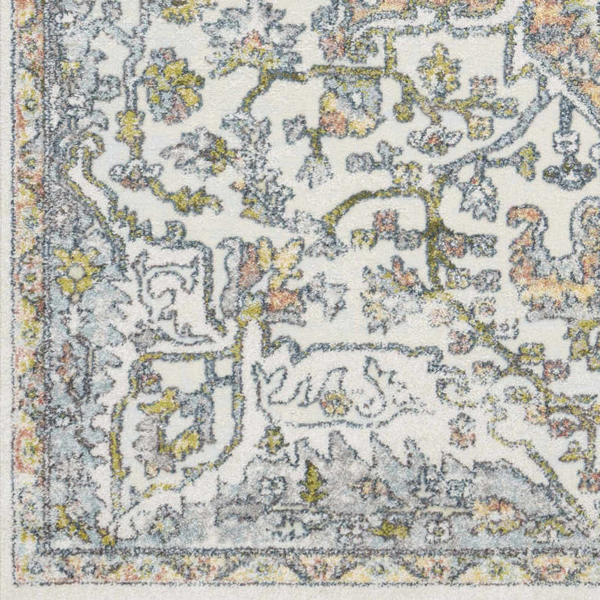 Close-up of the Reubens Area Rug, showcasing its traditional floral pattern in cream, gray, yellow, and peach tones. Swatch