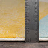 Close-up of Ringgold Area Rug showing pile height, with aqua, mustard, and taupe colors. Clearance rug. Pile